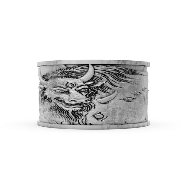 Silver cuff bracelet with engraved design on a white background