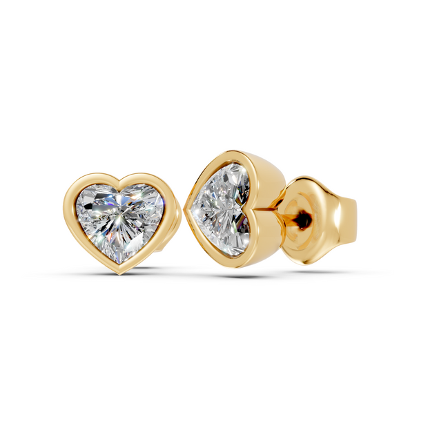 heart bezel gold studs side angled