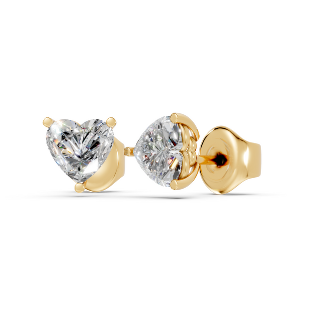 heart studs front and angled in yellow gold
