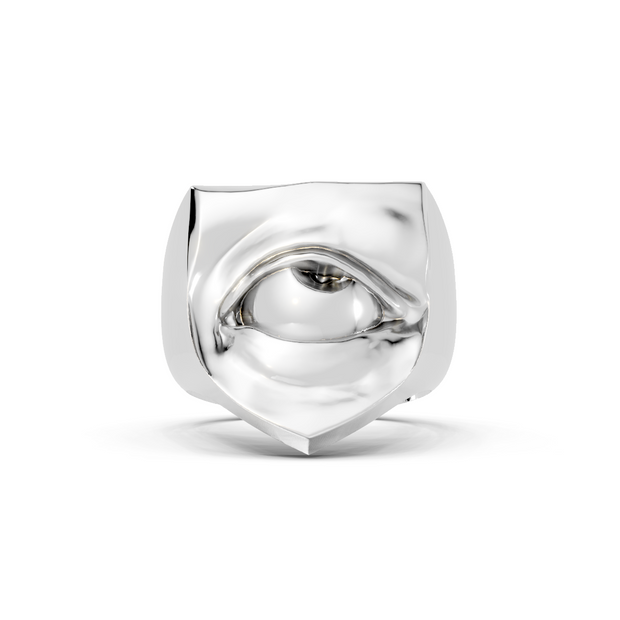 Silver ring with a unique design on a white background