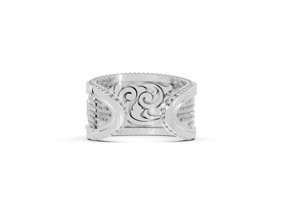 Silver ring with intricate design on a white background