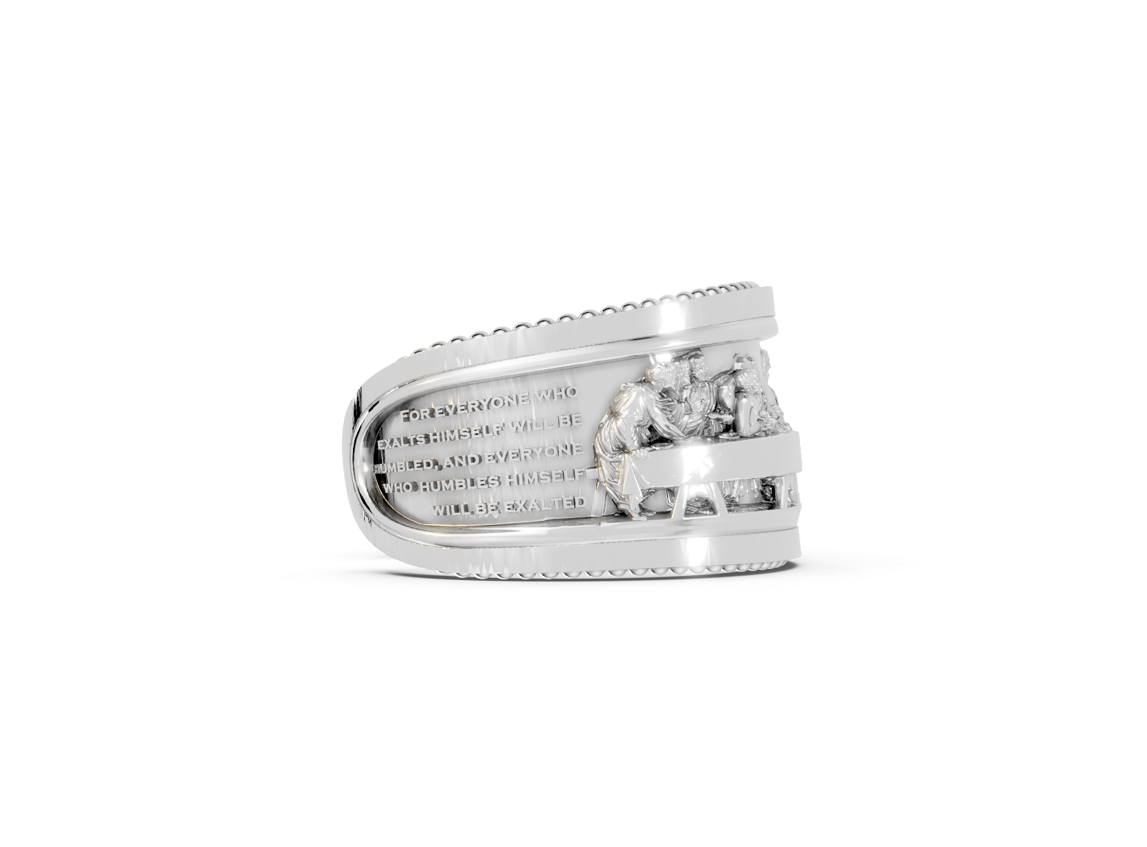 Silver ring with engraved text and design on a white background