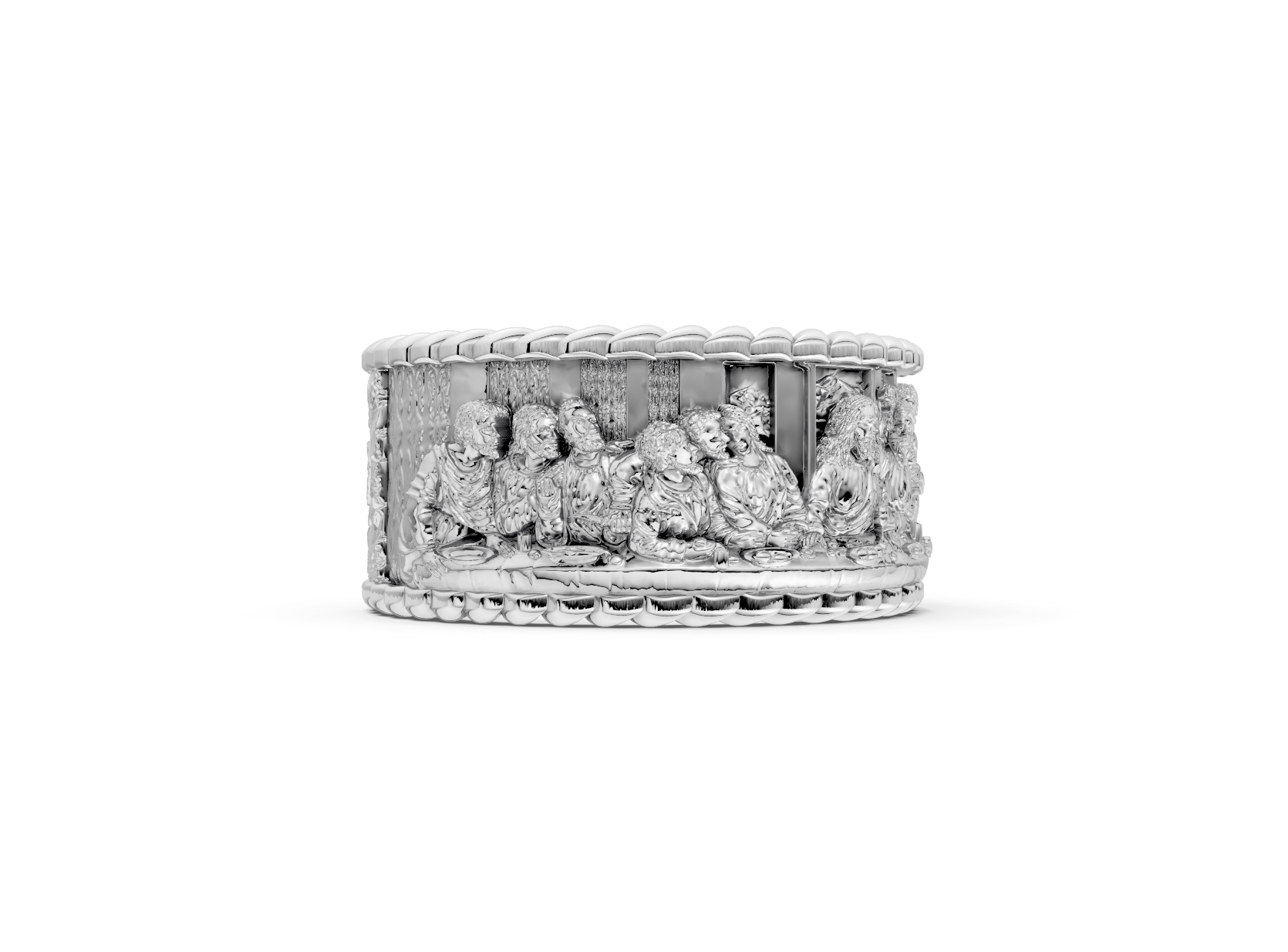 Silver ring with intricate design on a white background