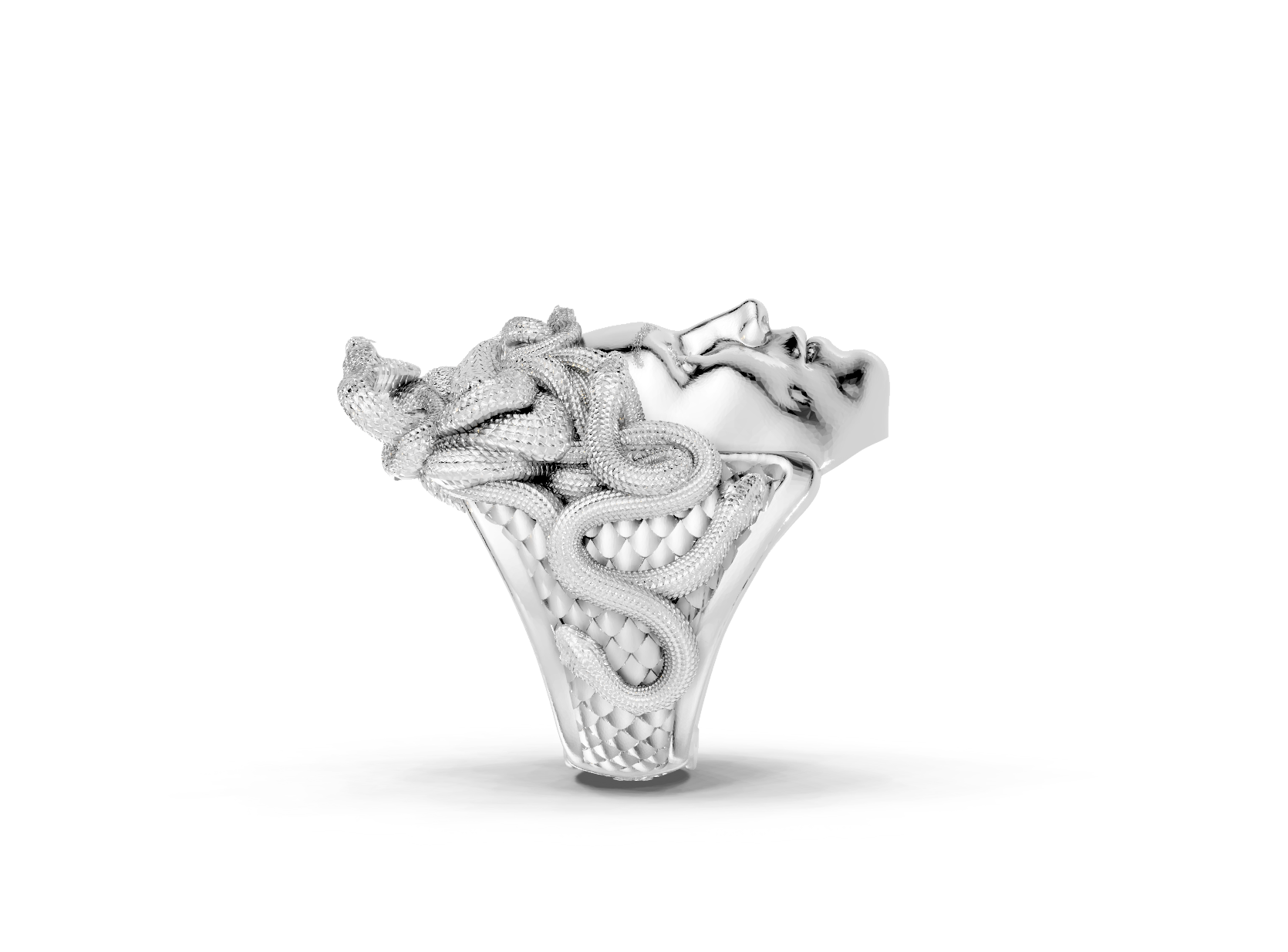 Silver ring with intricate design on a white background