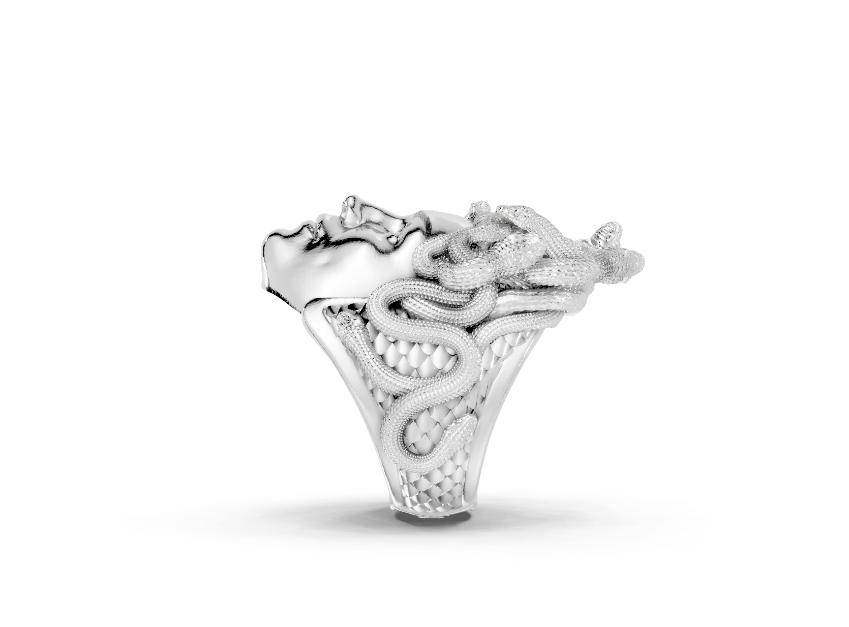 Silver ring with intricate design on a white background