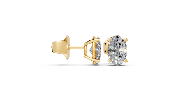 oval studs front and angled in yellow gold