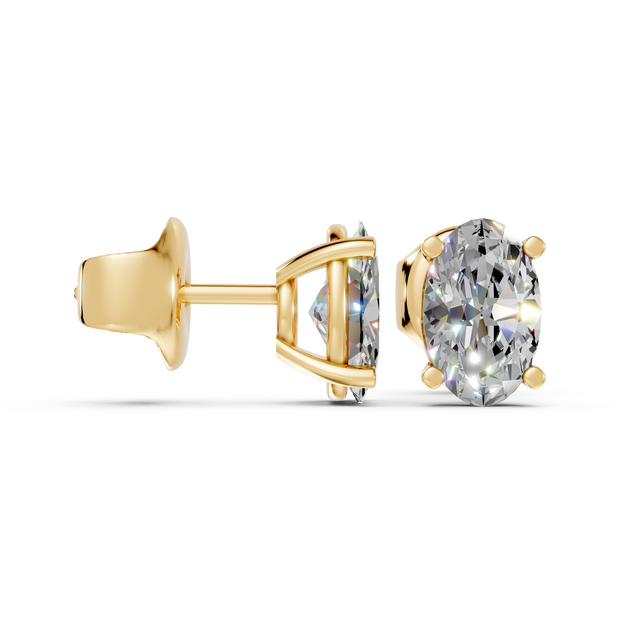 oval studs front and angled in yellow gold