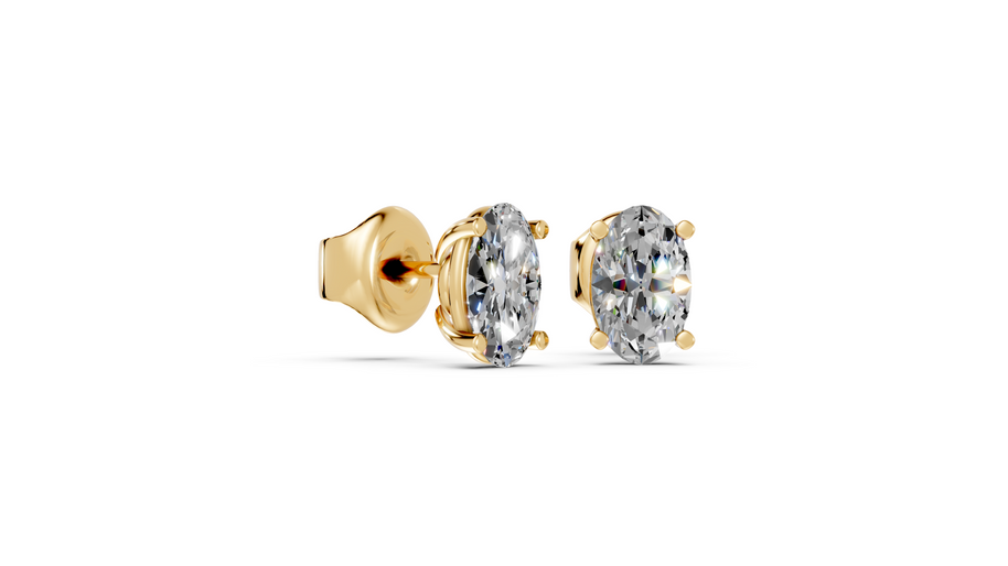 oval studs front and side in yellow gold