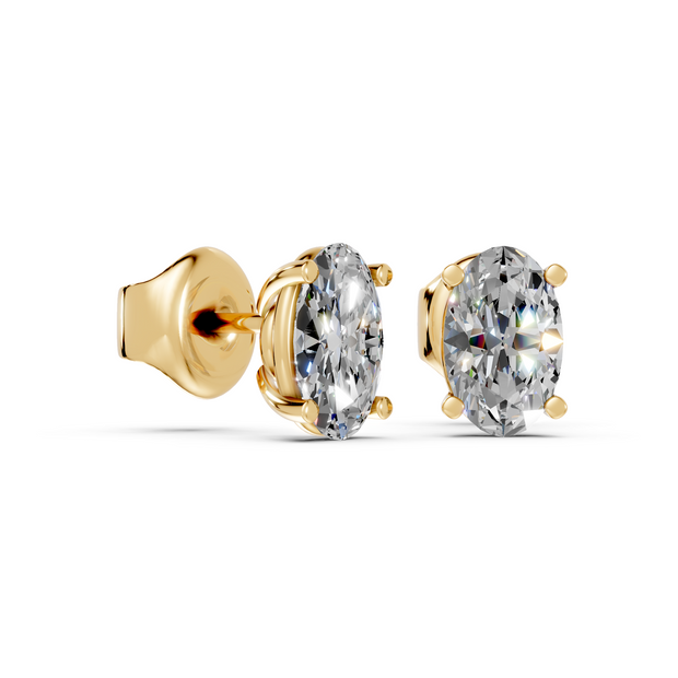 oval studs front and side in yellow gold